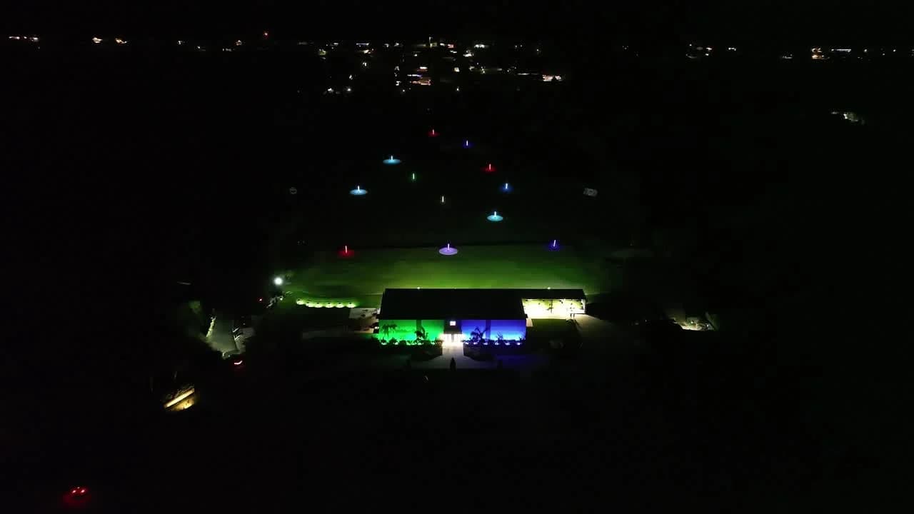 Illuminated iTarget Golf driving range at night