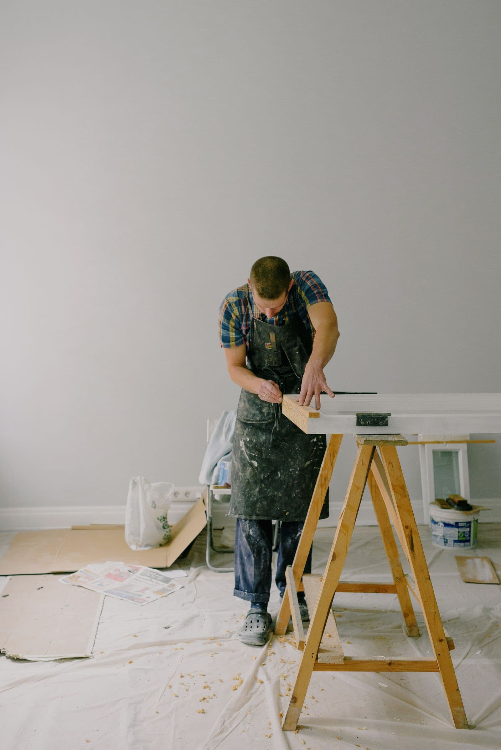 Hands-on woodwork during a home renovation